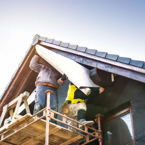 construction-workers-thermally-insulating-house-wi-2025-10-03-21-25-09-utc